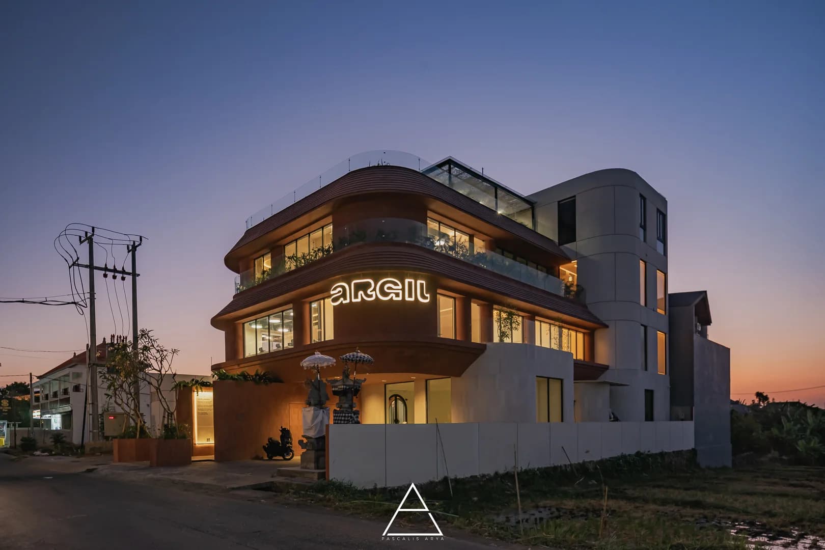 Argil at dusk, the sign lit